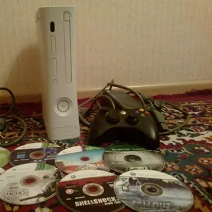 Продам Xbox 360 прошитая + 8 дисков